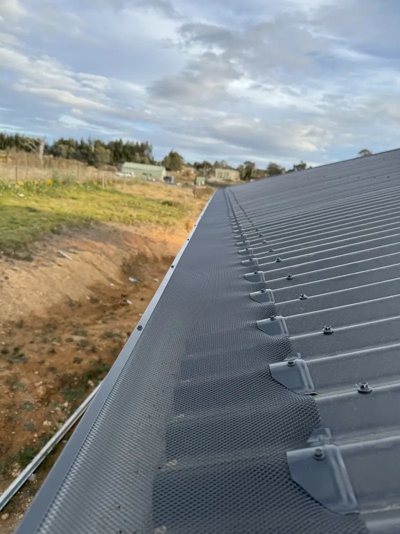 Mesh on a corrugated roof, rural outlook