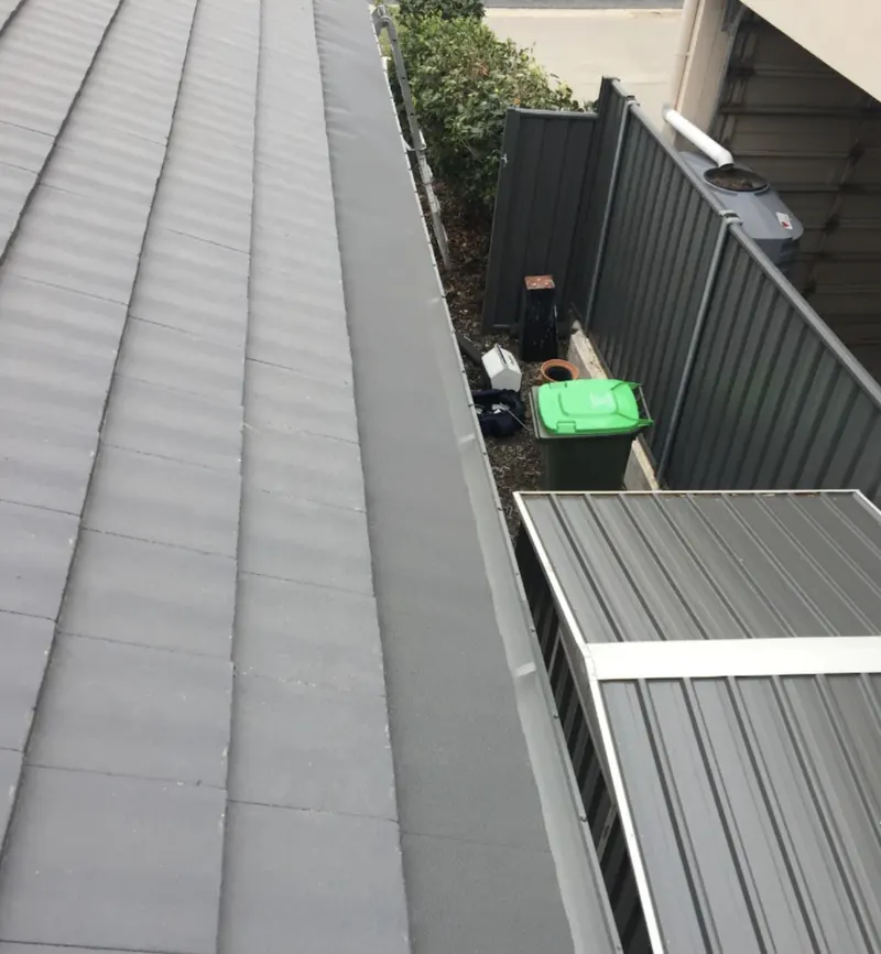 Mesh on a Woodland Grey tile roof